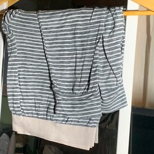 Gray and white Striped pyjama pants with pink waistband.